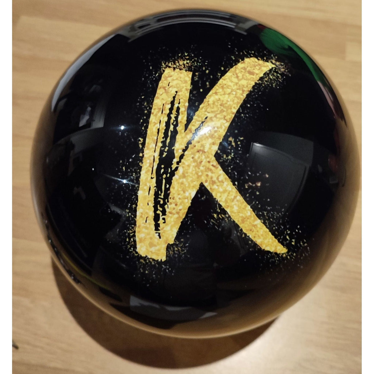 Black with sparkly K personalised bowling ball